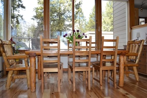 Lodgepole dining table with views of the mountains.