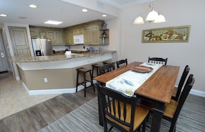 Dining area has full-sized dining table