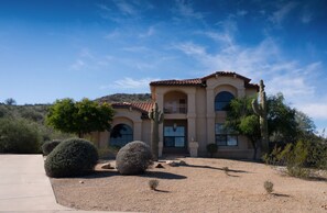 Sitting on a hill, this is your first view of Estrella Escape!  custom home