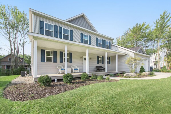 Front of house with spacious front porch. 