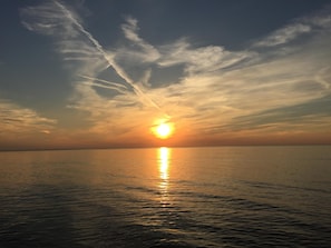 Enjoy beautiful Lake Michigan sunsets. 