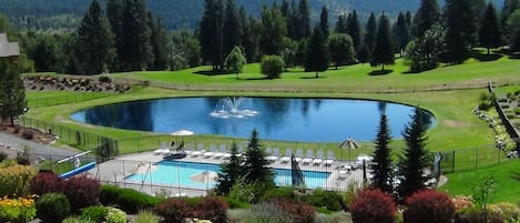 Peaceful view from our deck enjoying the view of mountains, river & golfcourse.