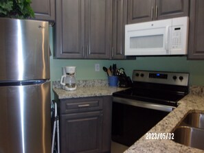 Kitchen with stainless appliances.