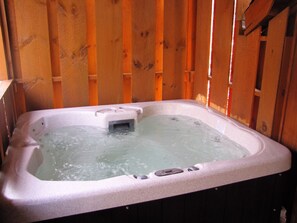 Large Hot Tub to relax your cares away.  A perfect way to relax after a day of hiking and shopping