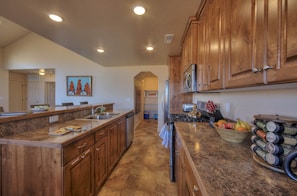 Kitchen, plenty of storage and an ice chest for use during your stay