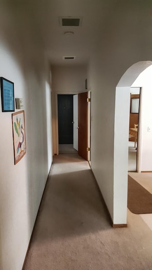 Hallway to bedrooms and bathrooms