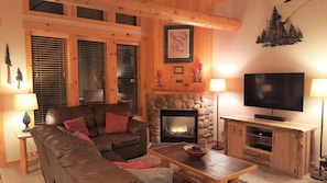 Living Room w/ Gas Fireplace, Large Flat Screen TV and Entertainment Cabinet