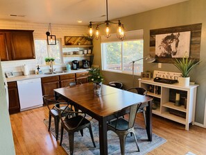 Kitchen / dining are leads out to beautiful deck and views.