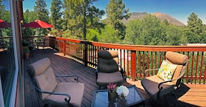 The gorgeous deck is fully furnished to relax in the cool pines & enjoy the view