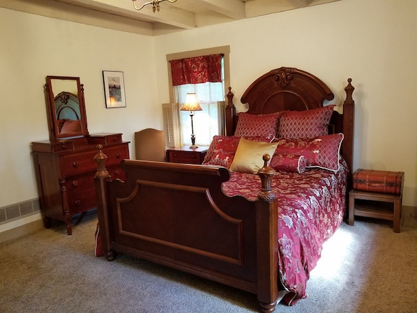 Private bedroom & bath, queen bed, luxury linens, window seat with view of lake.