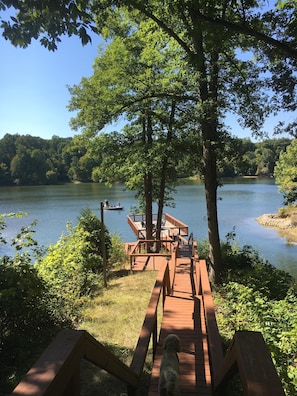 view from walkout basement looking towards lake/dock