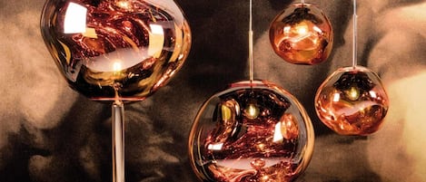 Unusual half-mentallised surface and flowing glow from Tom Dixon's Melt Lights