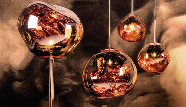 Unusual half-mentallised surface and flowing glow from Tom Dixon's Melt Lights