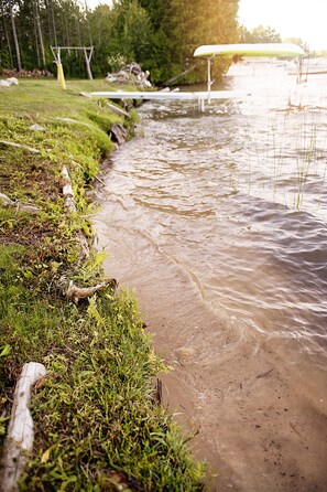 Firm sandy lake bottom.