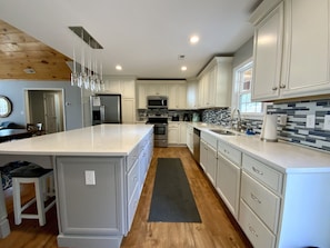 Fully stocked kitchen, Keurig and drip coffee pot.