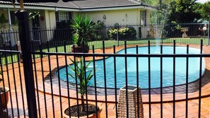 Solar heated swimming pool to use in the warmer months