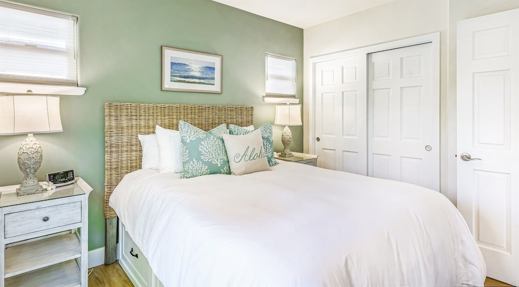 This house rental Hawaii features a bedroom with white interior