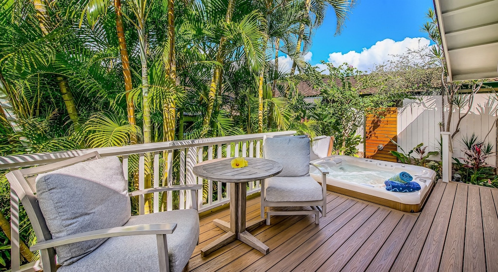 Cozy lanai with chairs and a jacuzzi at this Airbnb Maui