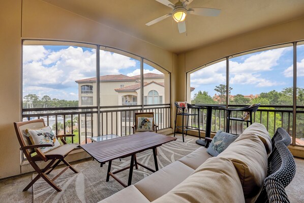 Outdoor living room with marina views