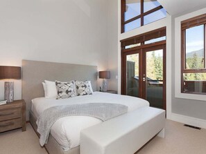 Primary bedroom: King bed, balcony access