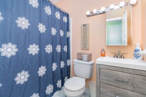 Here is the hall bathroom for the living room and 2nd bedroom access.