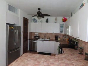 View of the well-equipped kitchen