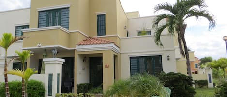 Front view of our villa located in a gated, safe & very quiet beach community.