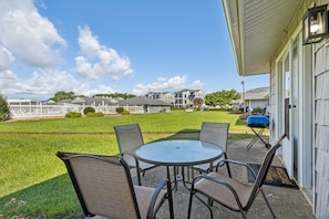 Your private little patio on the back of the home right next to the pool.