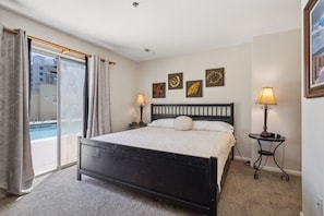 Walk into this king bedroom room with private pool access!