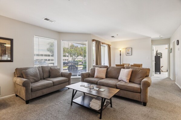 Your cozy living room: Catch a movie, play a game, or read a book to wind down after the beach!