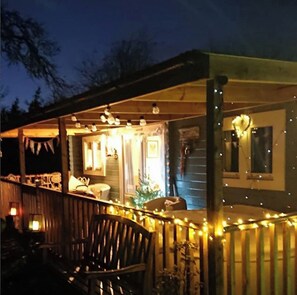 Night-time at Cuttermoon Lodge. Stargaze from the comfort of a toasty hottub 