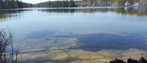 Beautiful Sand Pond as seen from the porch of this cottage.