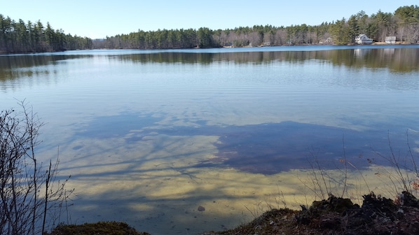 Beautiful Sand Pond as seen from the porch of this cottage.