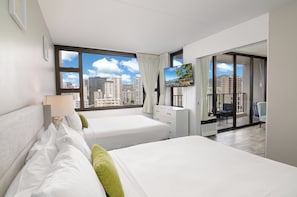 Relax on the bedroom with 2 queen-size beds