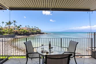 Snuggled against the ocean! Waterfront condo #119