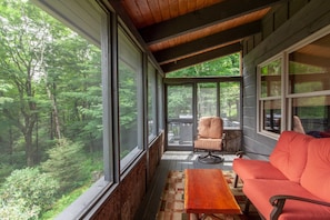 Screened Porch with Comfy Furniture