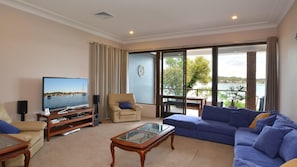 Loungeroom with flat screen TV and amazing views 