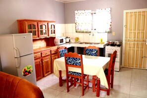 kitchen and dining room with all new appliances