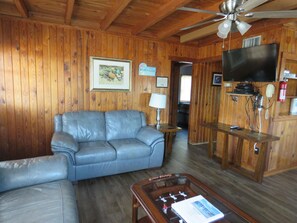 Living room has cable and a smart tv
