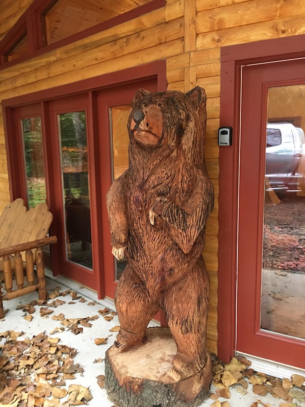 Big Bear stands guard over the cabin. 