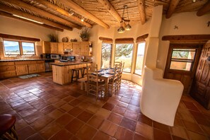 Foyer and dining area. Viga pole and latilla ceiling.