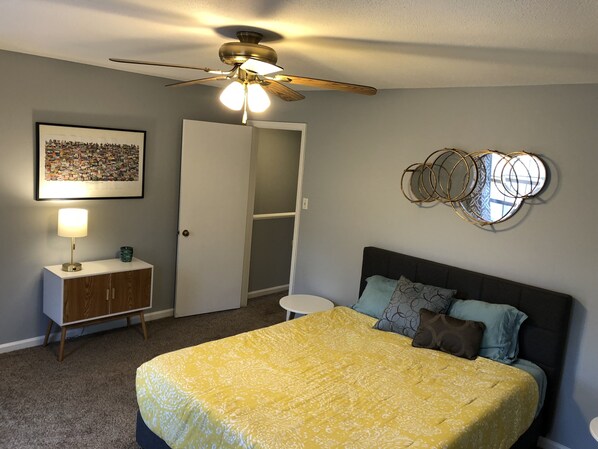 Large bedroom with a Serta pillow top mattress for comfortable night sleep.