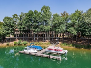 Dock with private boat slip right out the back door! Empty slip shown is yours!