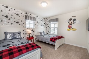 Step into the enchanting world of Mickey Mouse with this themed 2 bed bedroom. Every corner is adorned with the whimsy and wonder of Disney's iconic character, promising endless adventures and dreams come true.
