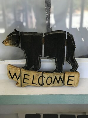 "WELCOME" black bear will greet you.