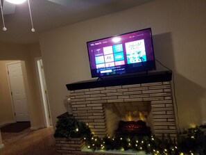 50" Roku TV and Stunning Electric Fireplace