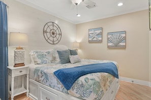Relax with luxury king bedding beach decor.