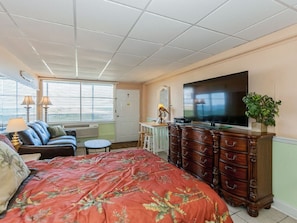 New real Top Grain Leather sofa and 60" HDTV.