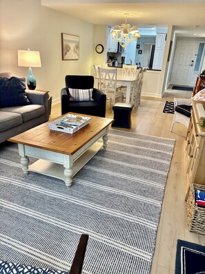 2025 new rug and many other updates...looking thru  dining room to Kitchen