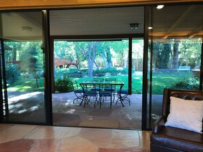Family room opens out to back porch & yard